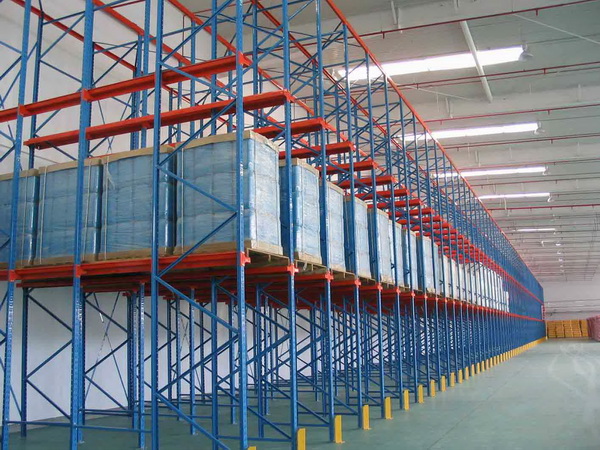 Drive-in racking lanes holding palletized goods in a warehouse