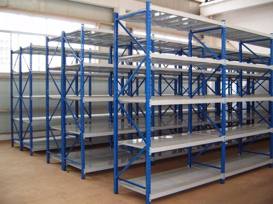 Blue medium-duty long span shelving with multiple open metal shelves