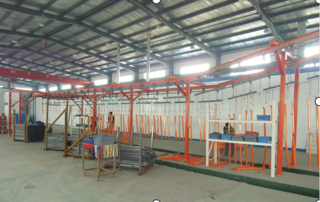 Metal components hanging on a factory production line